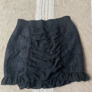 Black lacy mini skirt